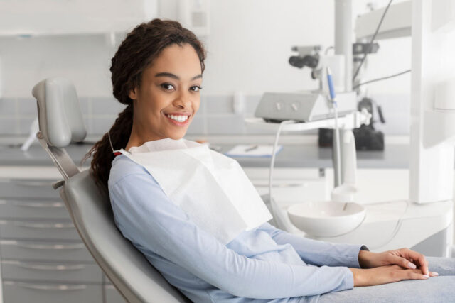 woman smiling at the dentist